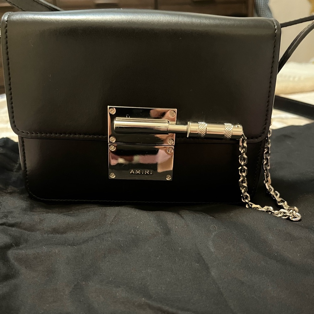Black messenger ￼ bag